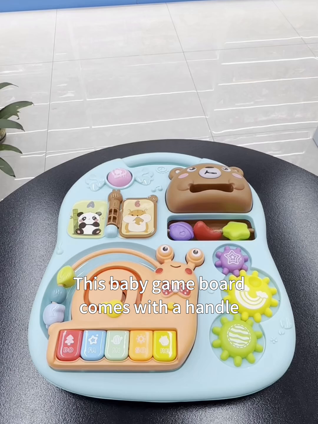 Portable baby game table with removable organ and storage basket for fun anytime anywhere