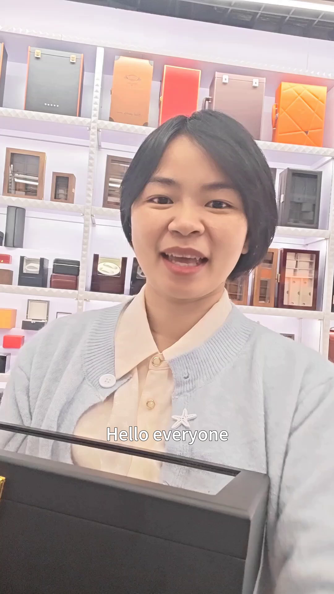 A neat storage box for watches and glasses with wooden style and golden accents